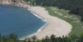 侵蚀海岸平面复合式海滩修复方法